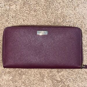 Kate Spade, purple/plum wallet.